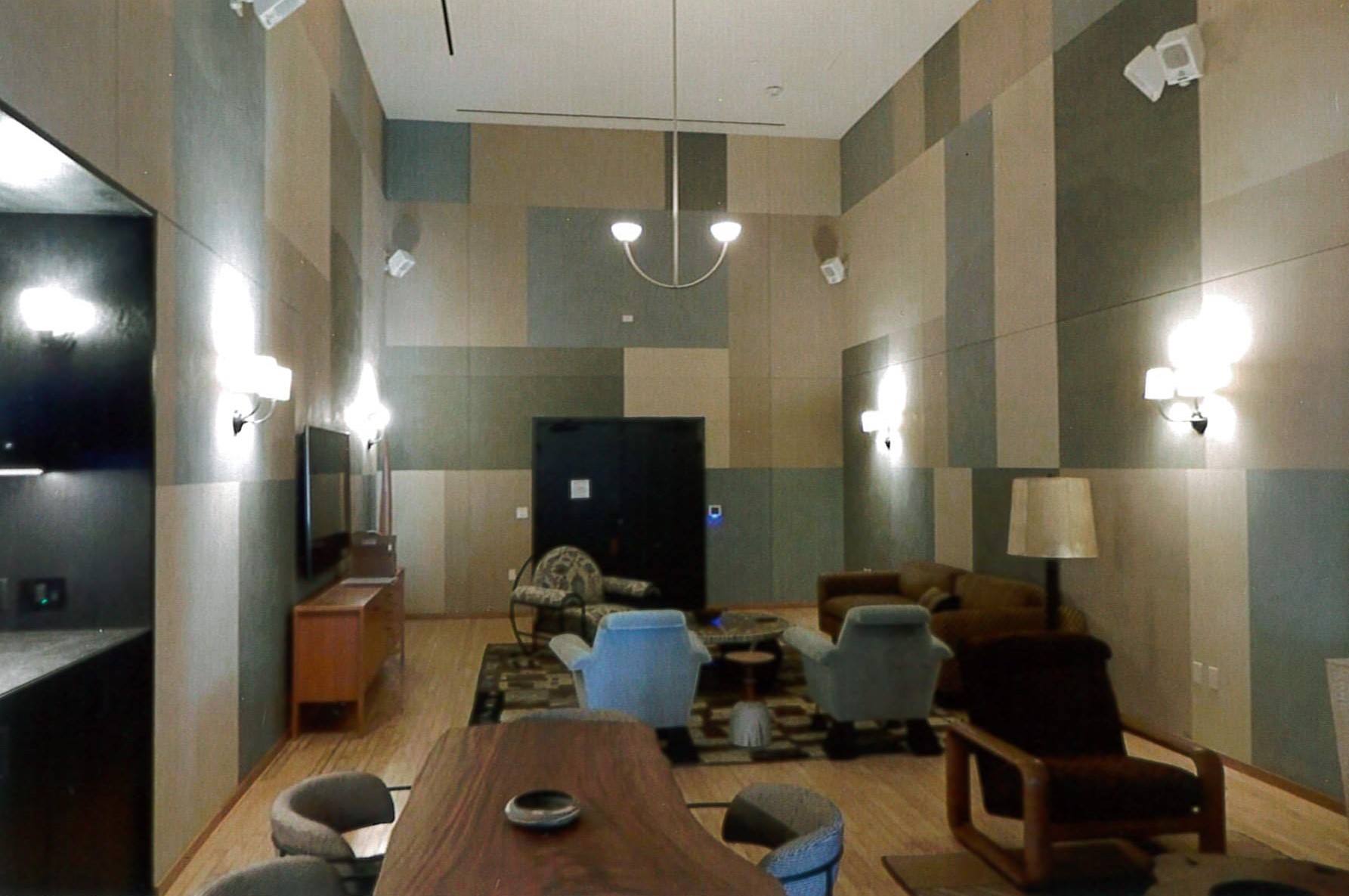 6th floor handball court converted into a hotel room suite with refinished handball flooring 